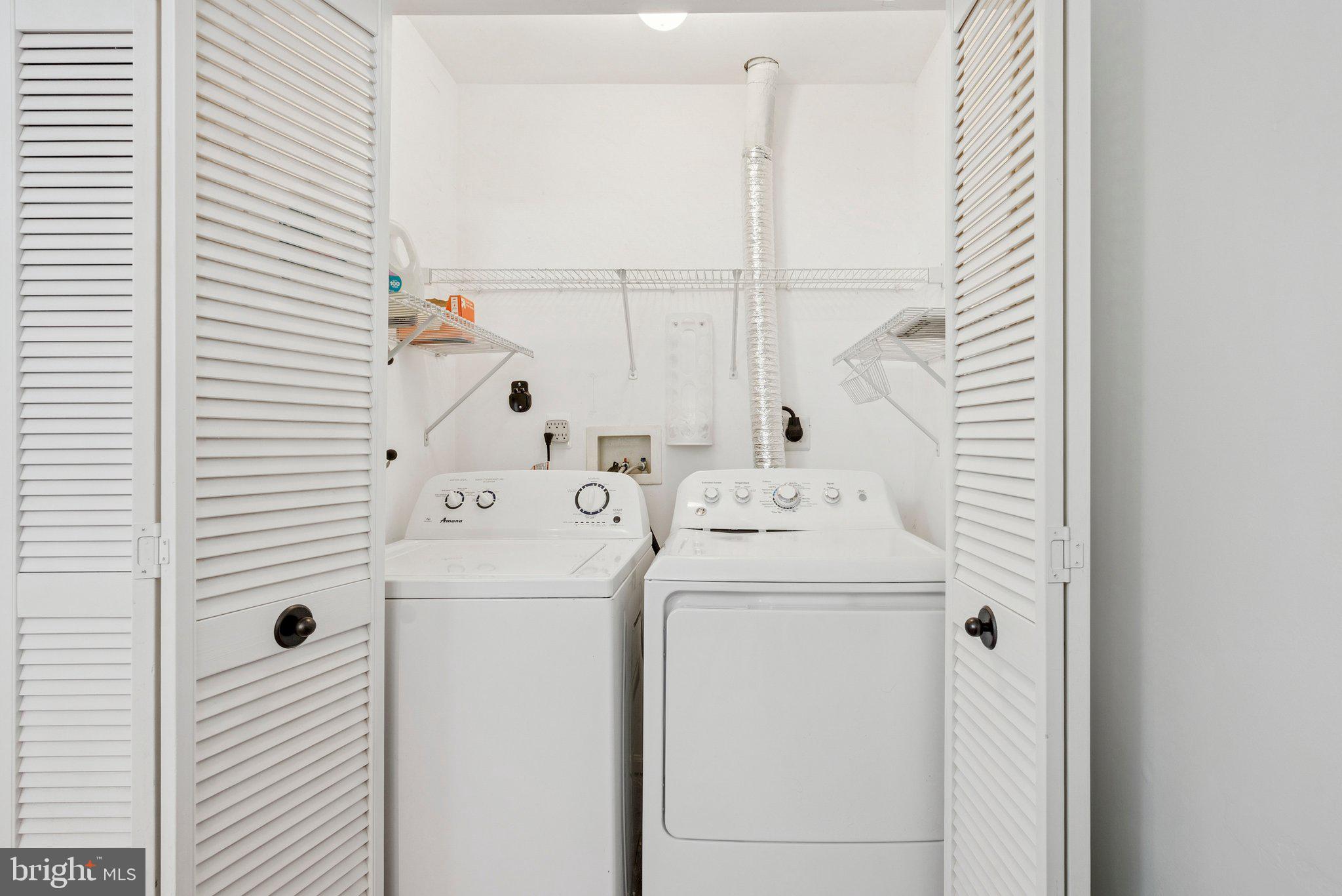 3559 Orchard Shade Road Randallstown, MD 21133 - Photo 16 of 18 a utility room with dryer and washer