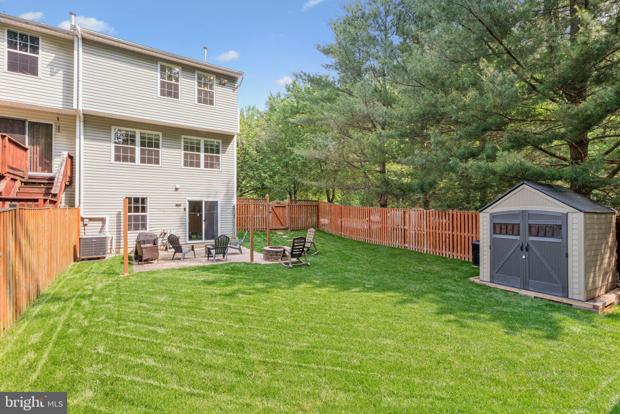 3559 Orchard Shade Road Randallstown, MD 21133 - Photo 18 of 18 a view of a house with backyard and sitting area