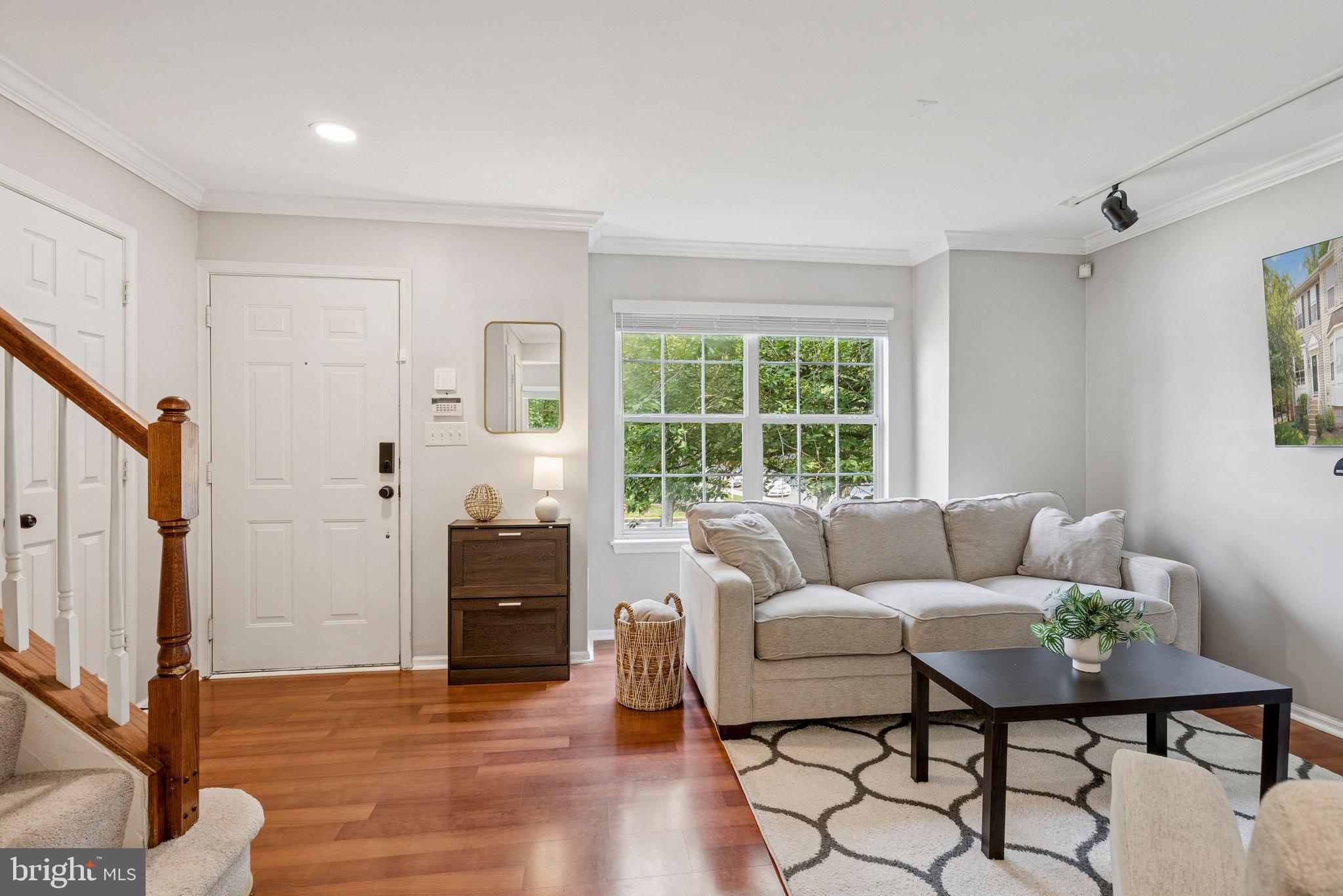 3559 Orchard Shade Road Randallstown, MD 21133 - Photo 4 of 18 a living room with furniture and a window