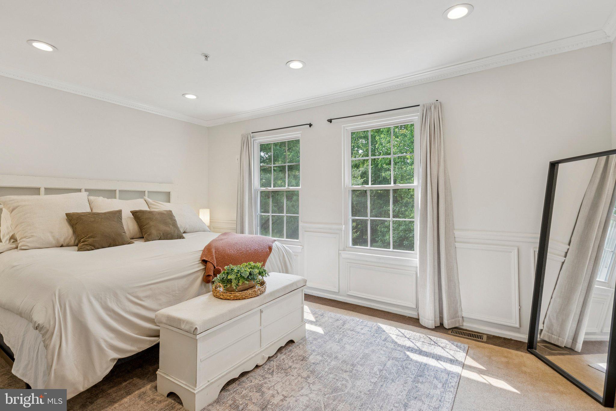 3559 Orchard Shade Road Randallstown, MD 21133 - Photo 9 of 18 a bedroom with a bed and a window