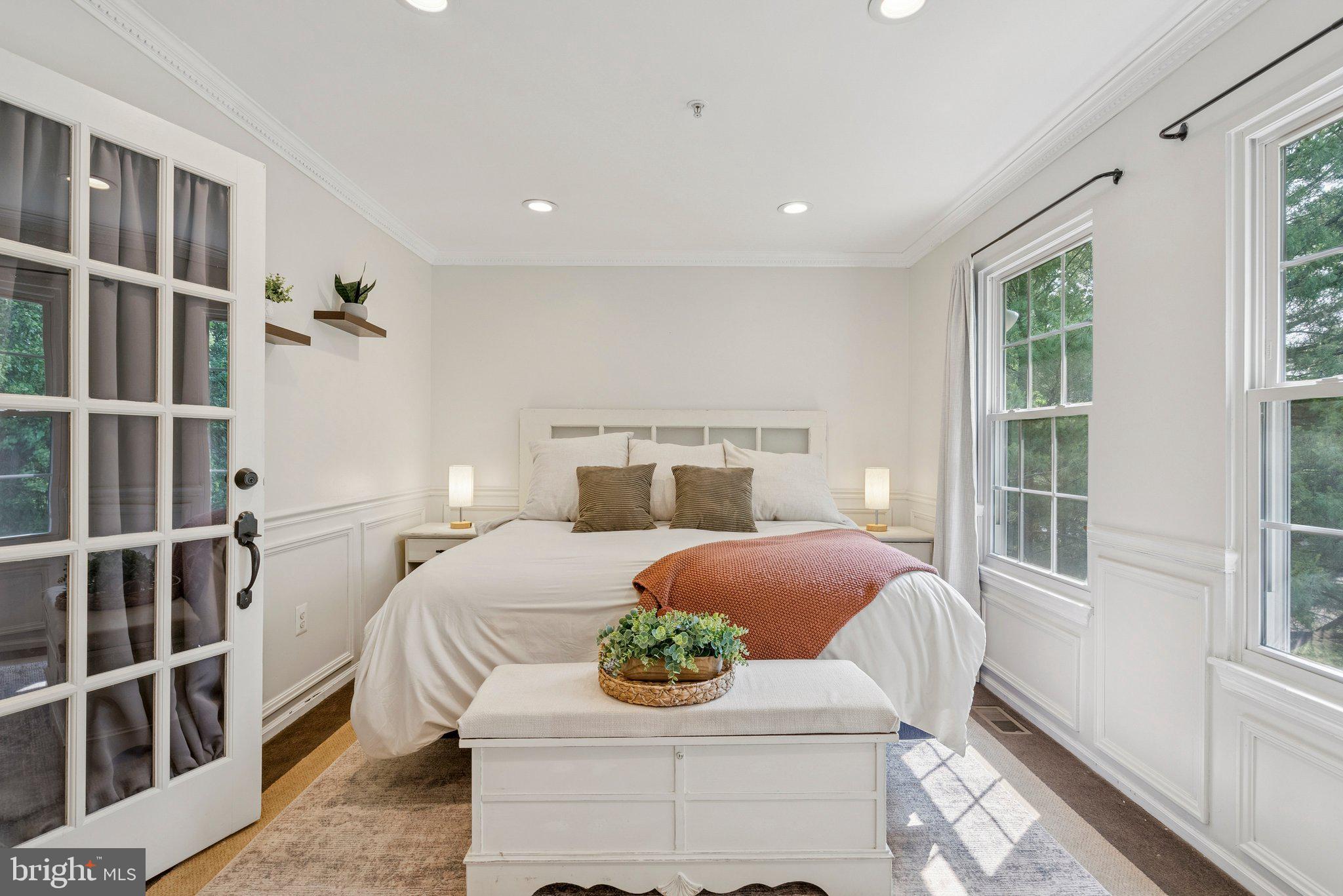 3559 Orchard Shade Road Randallstown, MD 21133 - Photo 10 of 18 a bedroom with a bed and a window