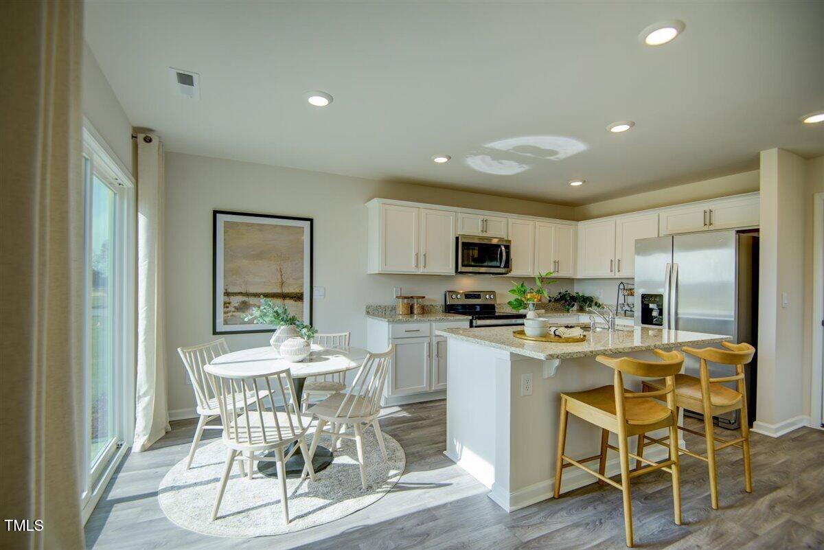 5513 Musket Court Raleigh, NC 27610 - Photo 9 of 26 22-1906_Butterfield-8
