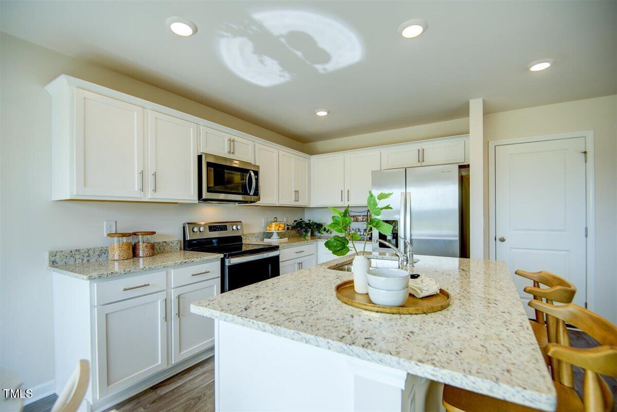 5513 Musket Court Raleigh, NC 27610 - Photo 10 of 26 23-1906_Butterfield-9