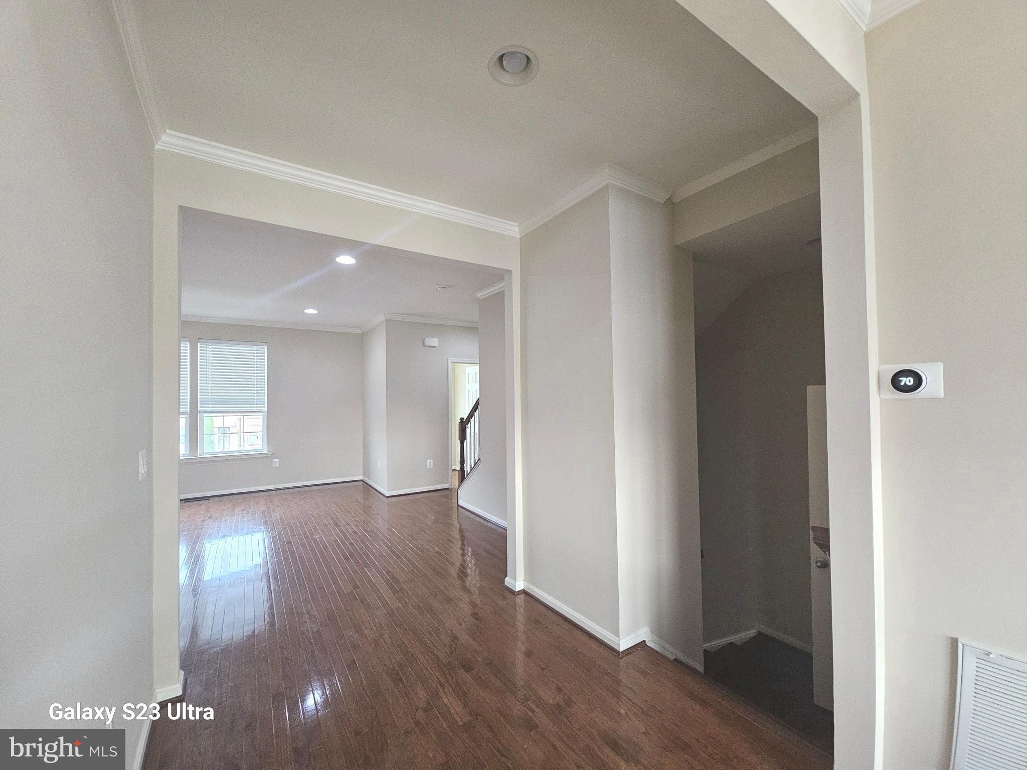 25634 Pleasant Valley Road Chantilly, VA 20152 - Photo 18 of 40 a view of a hallway with wooden floor