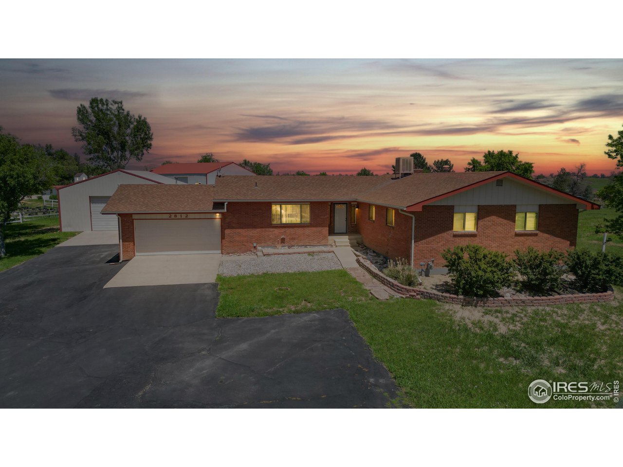 a house view with a garden space
