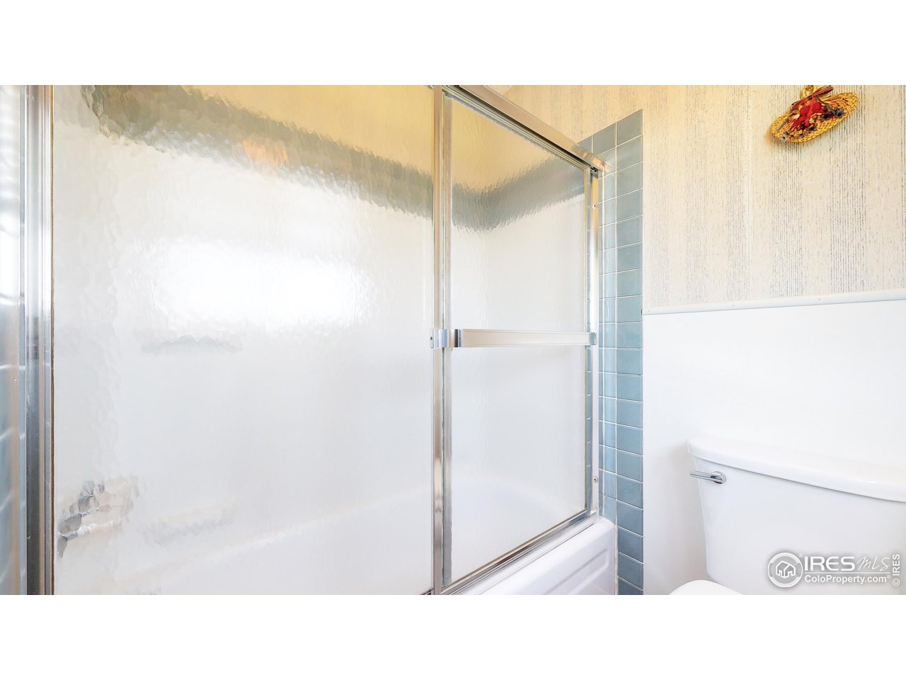 2812 Lake Hollow Road Berthoud, CO 80513 - Photo 21 of 39 a bathroom with a shower and a sink