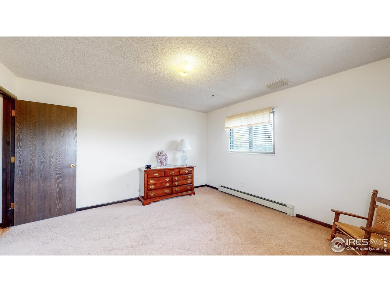 2812 Lake Hollow Road Berthoud, CO 80513 - Photo 28 of 39 a black and white photo of a living room