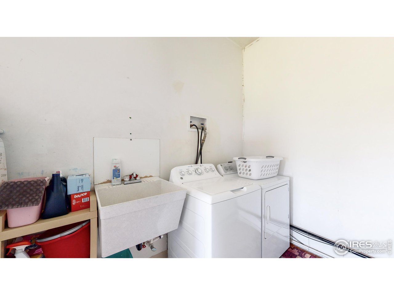 2812 Lake Hollow Road Berthoud, CO 80513 - Photo 30 of 39 a kitchen with a sink and cabinets