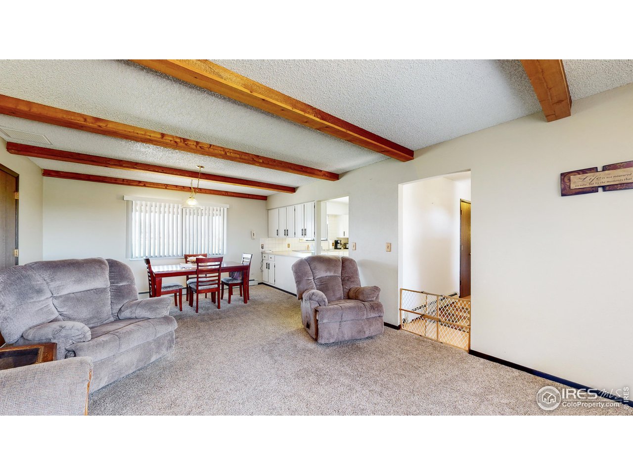 2812 Lake Hollow Road Berthoud, CO 80513 - Photo 5 of 39 a living room with furniture and a table