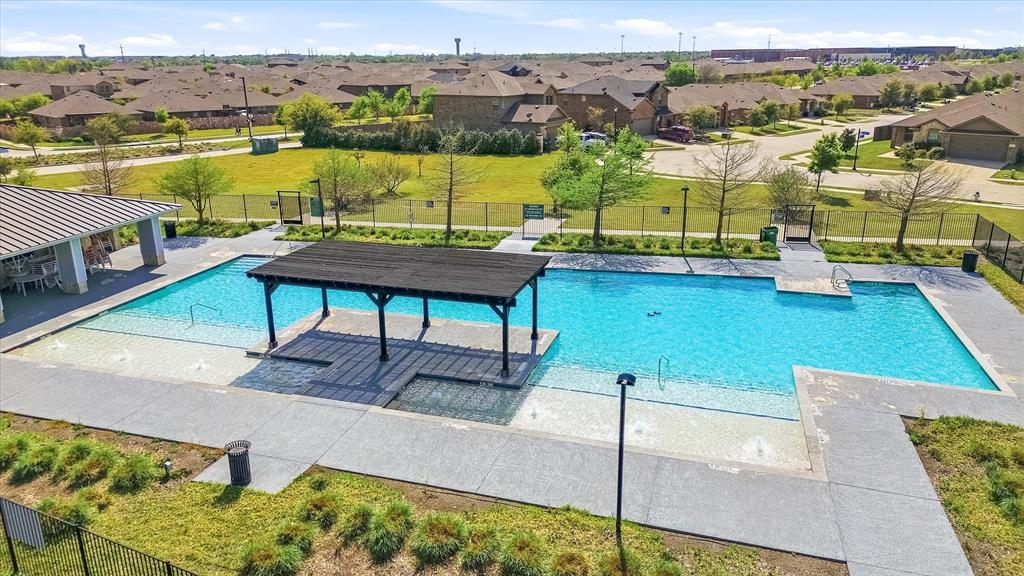 2126 Rubin Road Fate, TX 75189 - Photo 15 of 19 a view of a swimming pool with seating area