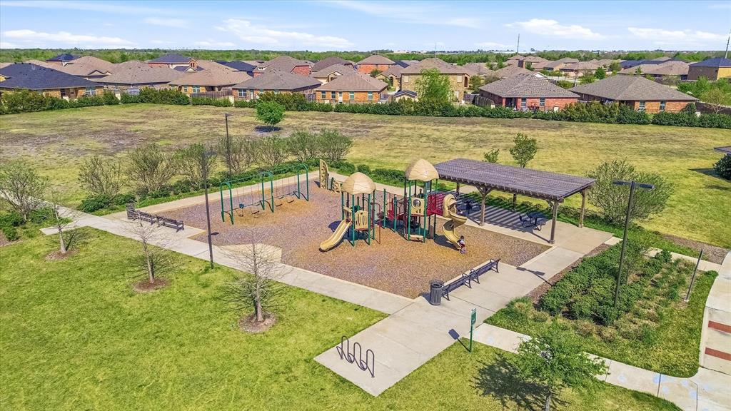 2126 Rubin Road Fate, TX 75189 - Photo 17 of 19 an aerial view of a house with a lake view