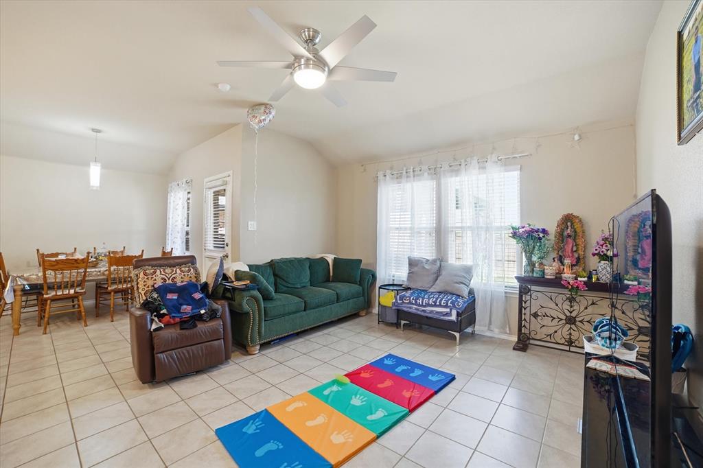 2126 Rubin Road Fate, TX 75189 - Photo 2 of 19 a living room with furniture and a flat screen tv
