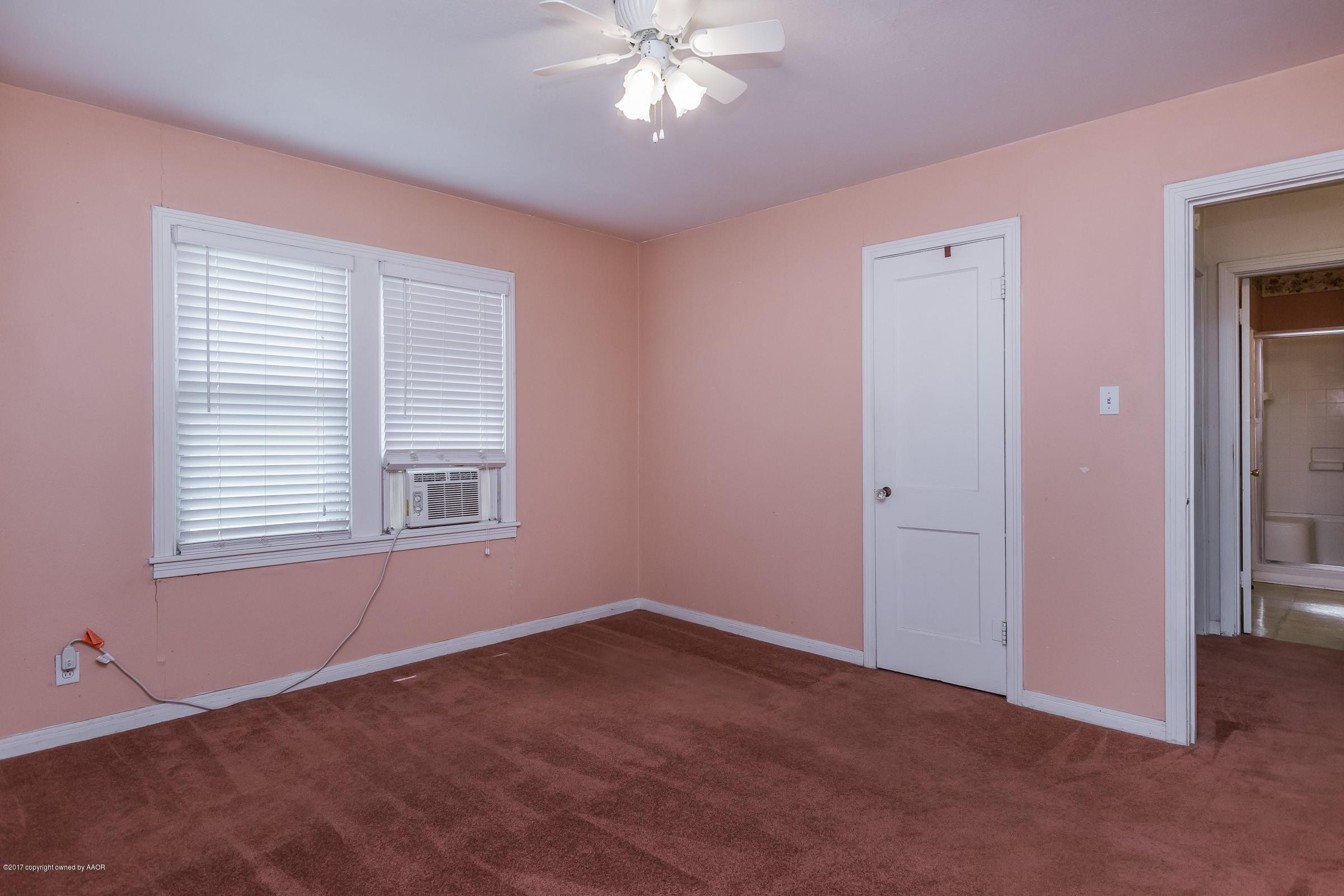 4220 South Harrison Street Amarillo, TX 79110 - Photo 10 of 15 a view of an empty room with a window