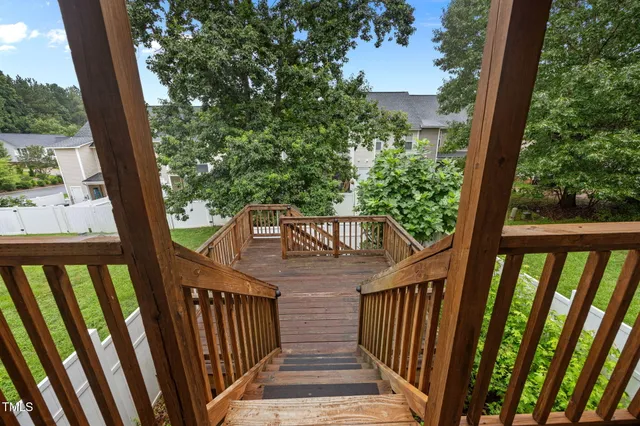 a view of a wooden fence