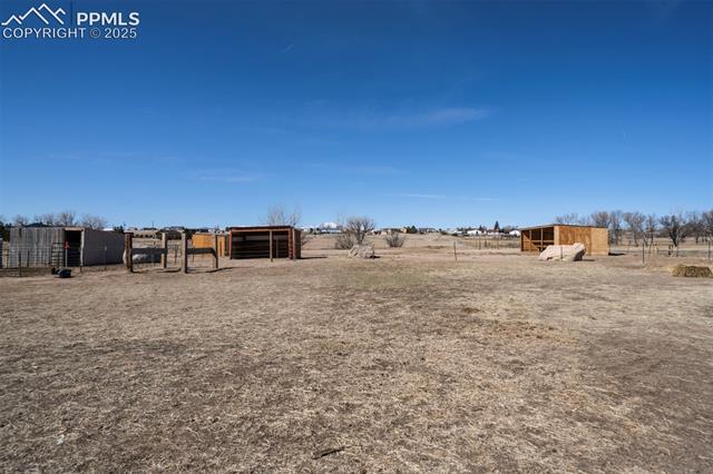 5860 Curtis Road Peyton, CO 80831 - Photo 25 of 28 Property entrance with stucco siding