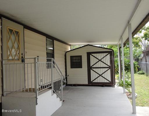 6828 Mediterranean Road Orlando, FL 32822 - Photo 8 of 10 6828 Mediterranean Carport