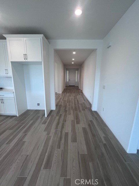 24261 Arroyo Drive Menifee, CA 92584 - Photo 12 of 24 a view of a room with wooden floor