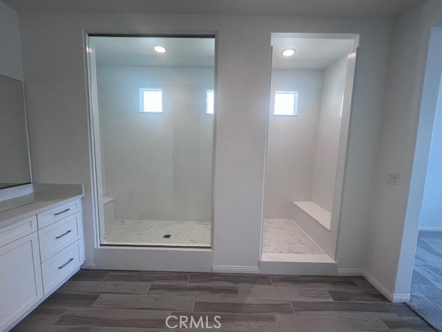 24261 Arroyo Drive Menifee, CA 92584 - Photo 17 of 24 a view of an empty room with wooden floor and closet
