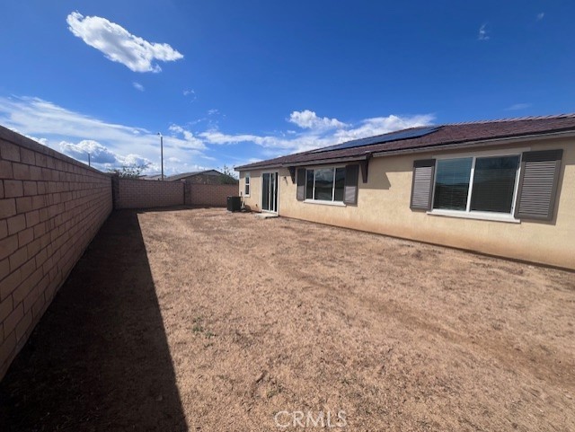 24261 Arroyo Drive Menifee, CA 92584 - Photo 24 of 24 a view of a house with a backyard