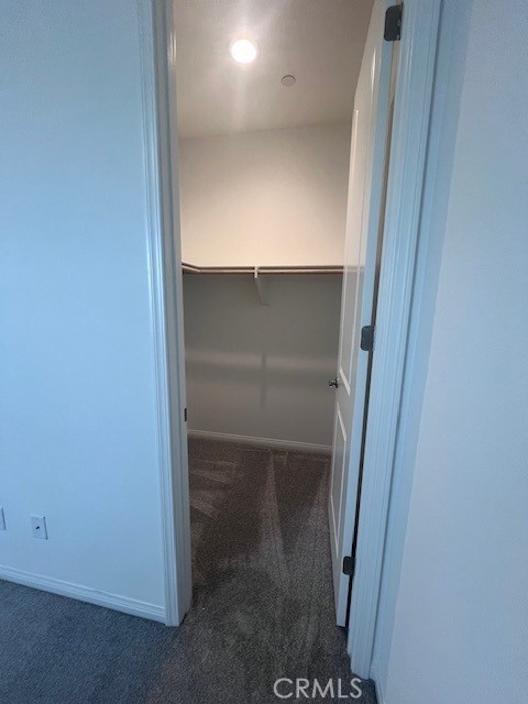 24261 Arroyo Drive Menifee, CA 92584 - Photo 6 of 24 a close view of walk in closet