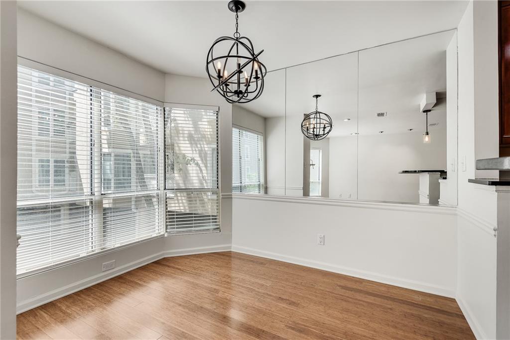 244 13th Street Northeast, Unit 118 Atlanta, GA 30309 - Photo 16 of 48 a view of a hallway with entryway wooden floor and front door