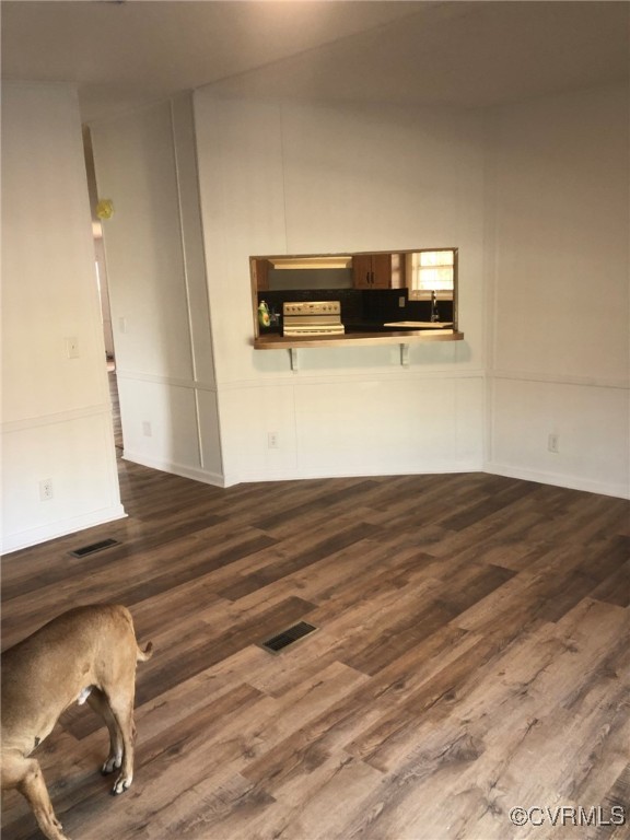 5523 Ridge Road Heathsville, VA 22473 - Photo 15 of 23 Unfurnished living room with dark hardwood / wood-