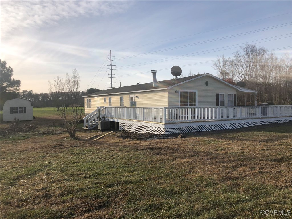 5523 Ridge Road Heathsville, VA 22473 - Photo 4 of 23 View of home's exterior featuring central AC, a de