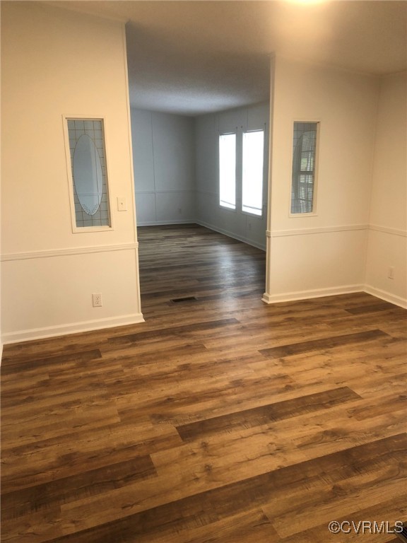5523 Ridge Road Heathsville, VA 22473 - Photo 8 of 23 Empty room with dark hardwood / wood-style floorin