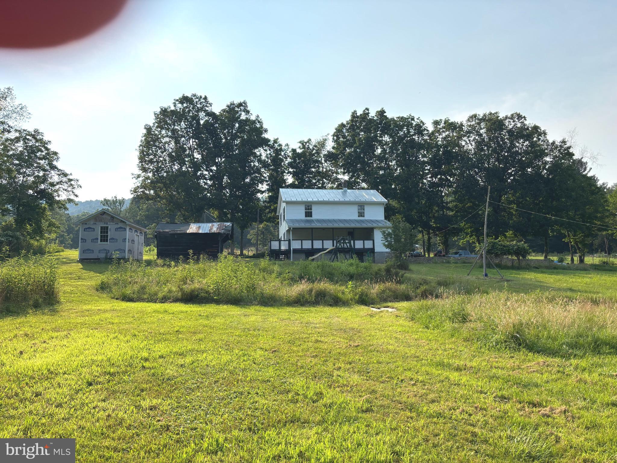 2600 Middle Cove Road Mathias, WV 26812 - Photo 28 of 30 a view of a house with a swimming pool