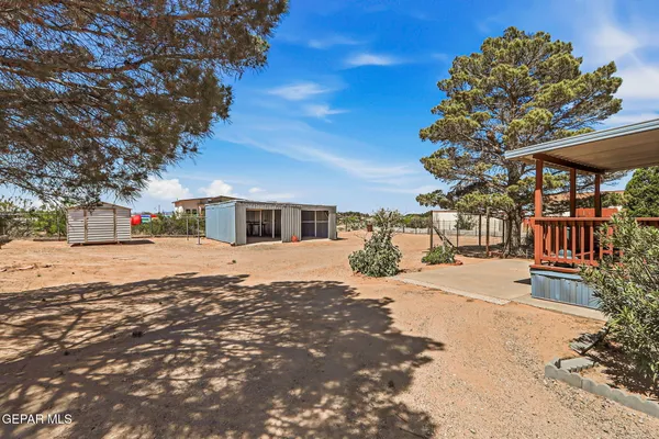 a view of a street with a building in the background
