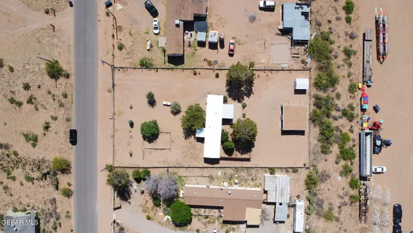 aerial view of a house with a swimming pool
