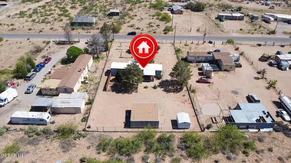 an aerial view of residential house with outdoor space