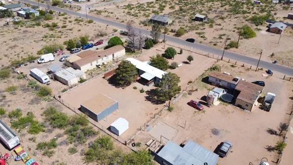 an aerial view of parked and sign board