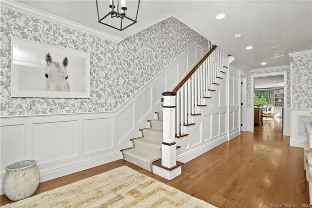 a view of entryway with wooden floor