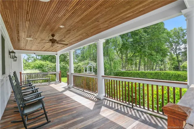 a view of a two chairs in the deck