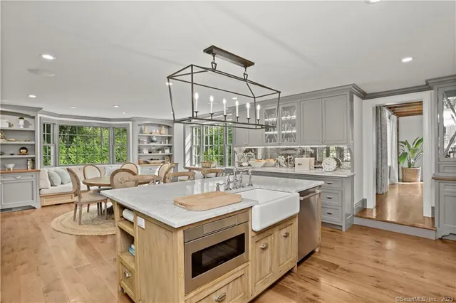 a kitchen with a stove and a microwave