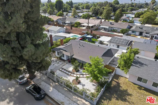 an aerial view of a city with lots of residential buildings