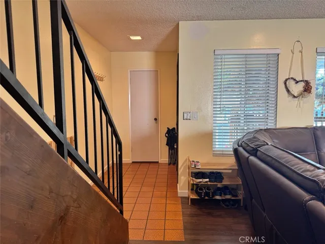 a bathroom with a shower and a sink