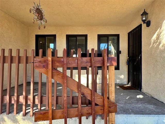a view of living room with stairs