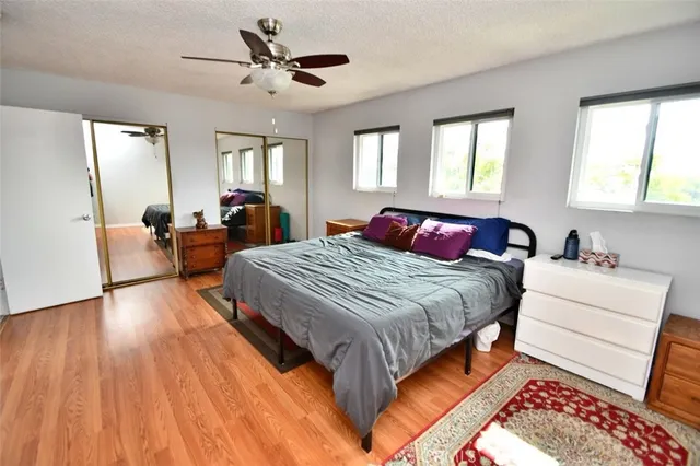 a work room with furniture and a flat screen tv