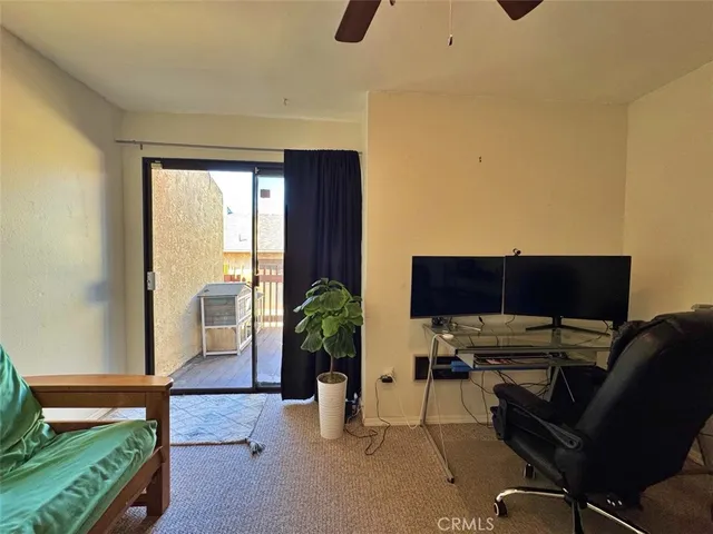 a view of parking garage with cars