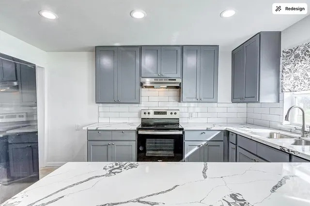 a kitchen with a sink stove and cabinets