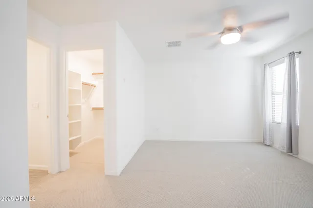 an empty room with a bathroom