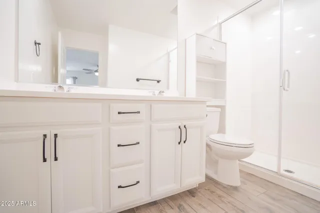 a view of a house with a swimming pool and sitting area