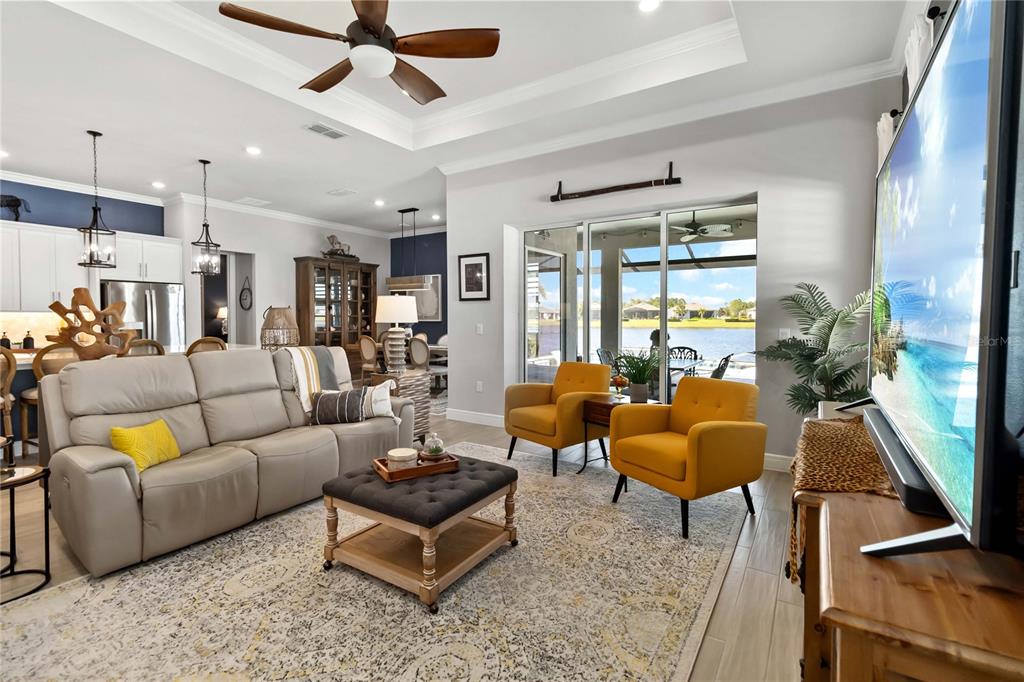 2744 Nature Vw Road St. Cloud, FL 34771 - Photo 18 of 49 a living room with furniture and a large window