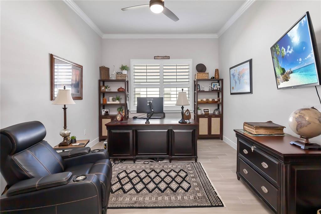 2744 Nature Vw Road St. Cloud, FL 34771 - Photo 32 of 49 a living room with furniture and a window
