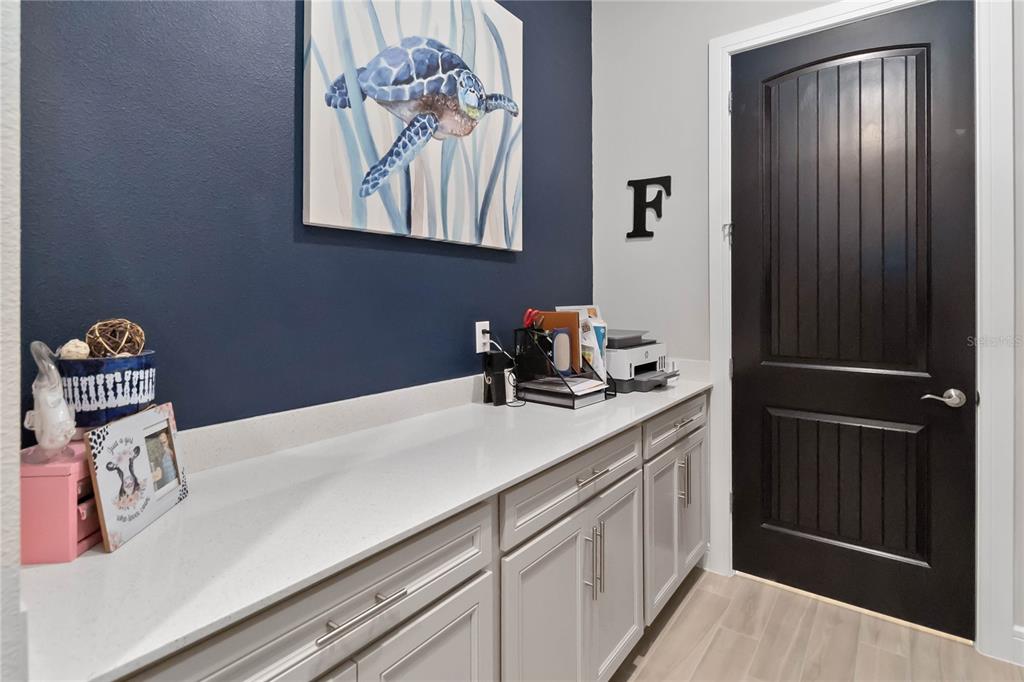 2744 Nature Vw Road St. Cloud, FL 34771 - Photo 35 of 49 a kitchen with a sink cabinets and a window