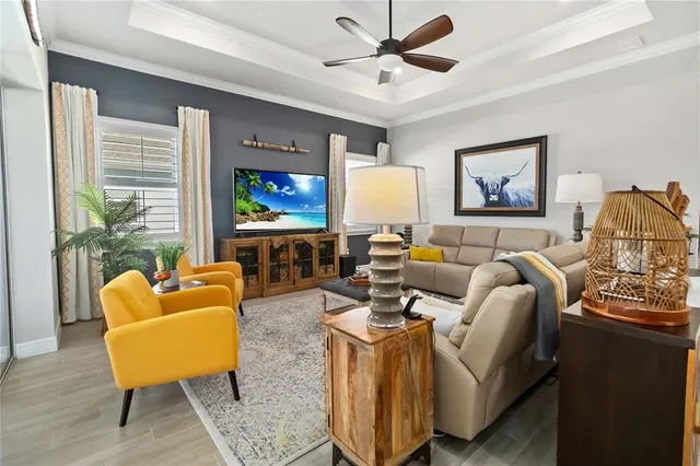 a living room with furniture and a window