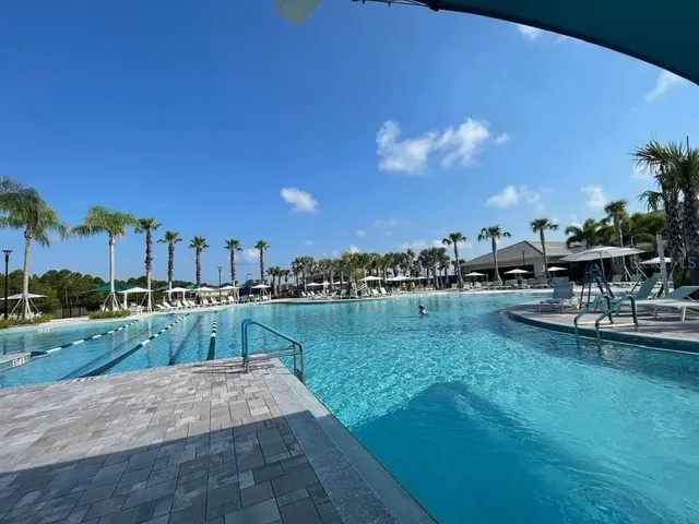a view of a lake with a house
