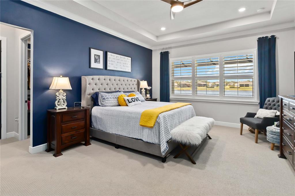 2744 Nature Vw Road St. Cloud, FL 34771 - Photo 9 of 49 a bed room with a bed and a couch